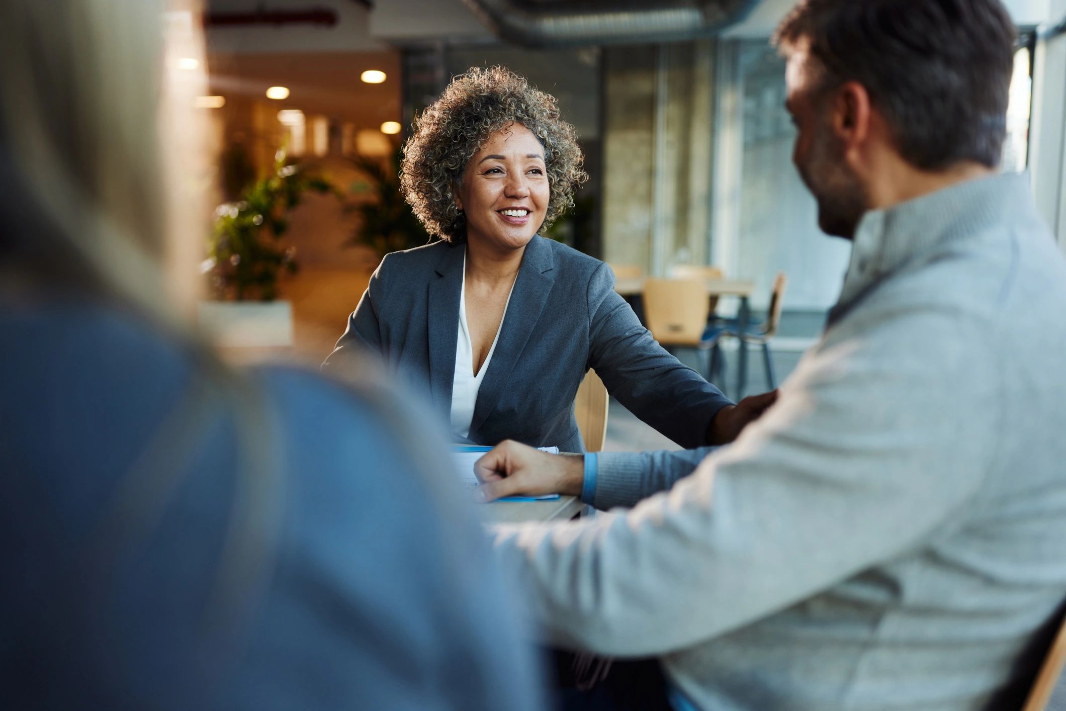 Real estate agent meeting with clients
