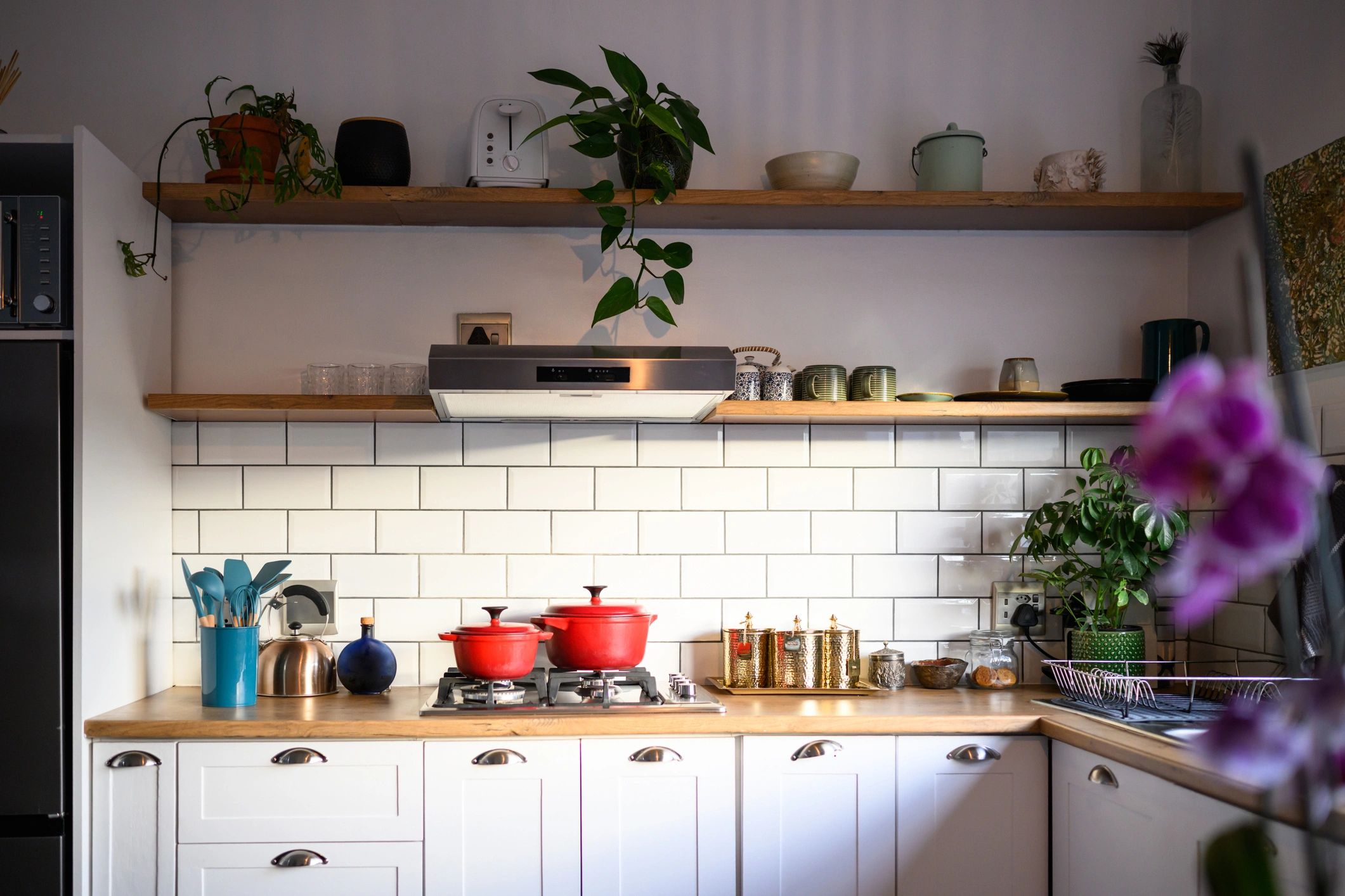 Modern kitchen with white cabinets and subway tile backsplash